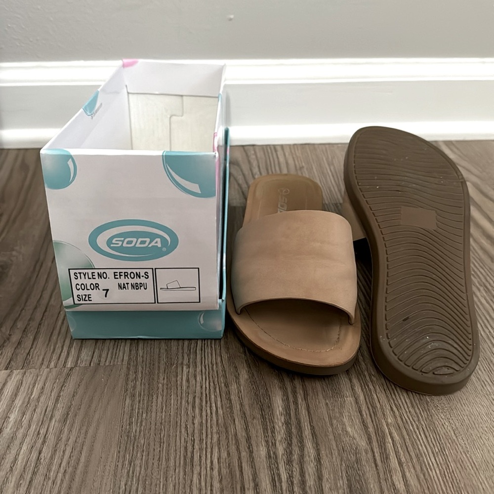 Gently used faux leather slides